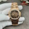 Patek Philippe Nautilus 5723/1R-010 Brown Dial Custom 18K Solid Gold Baguette Diamonds 40mm