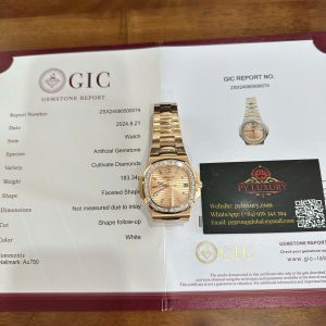 Patek Philippe Nautilus 5723/1R-001 Pink Golden Dial 18K Solid Gold Baguette Diamonds 40mm