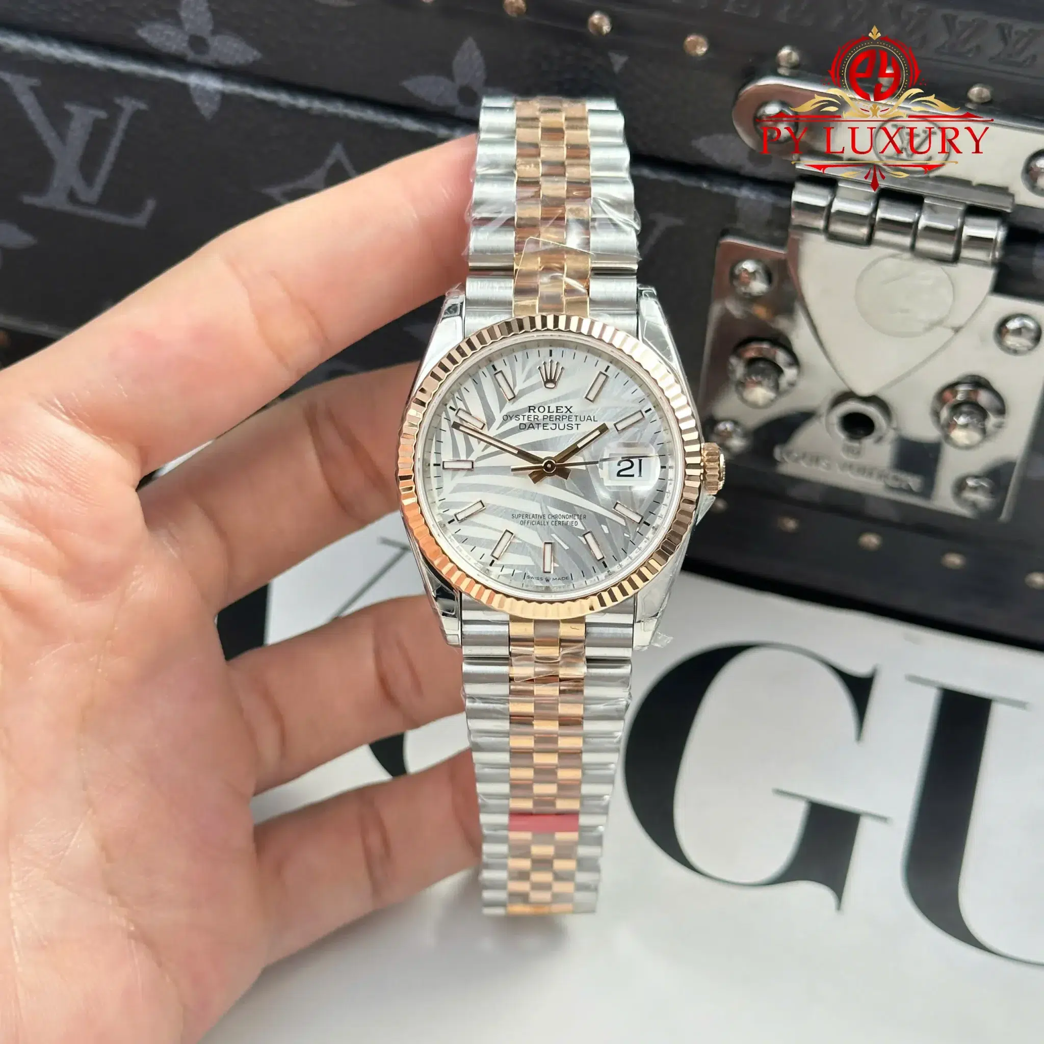 Rolex Datejust 36 Rose Gold Steel Palm Motif Dial Fluted Bezel Jubilee Bracelet - 11 Rolex Datejust 126231 Rose Gold Steel Silver Palm Motif Dial Luminous Hour Markers Jubilee 11 Best Replica